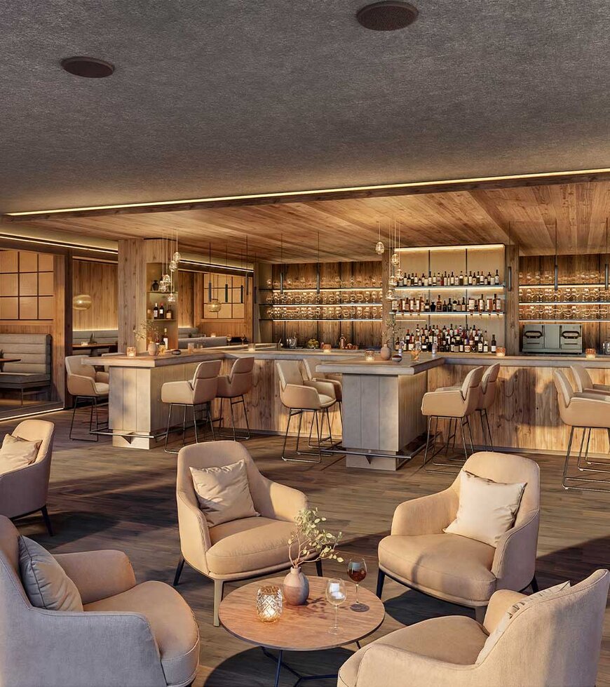 TheGreen-Visualisierung-EverGreenBar Moderne Bar mit Holzvertäfelung, mehreren Sitzbereichen mit Sesseln und Barhockern sowie beleuchteten Regalen mit Flaschen im Hintergrund